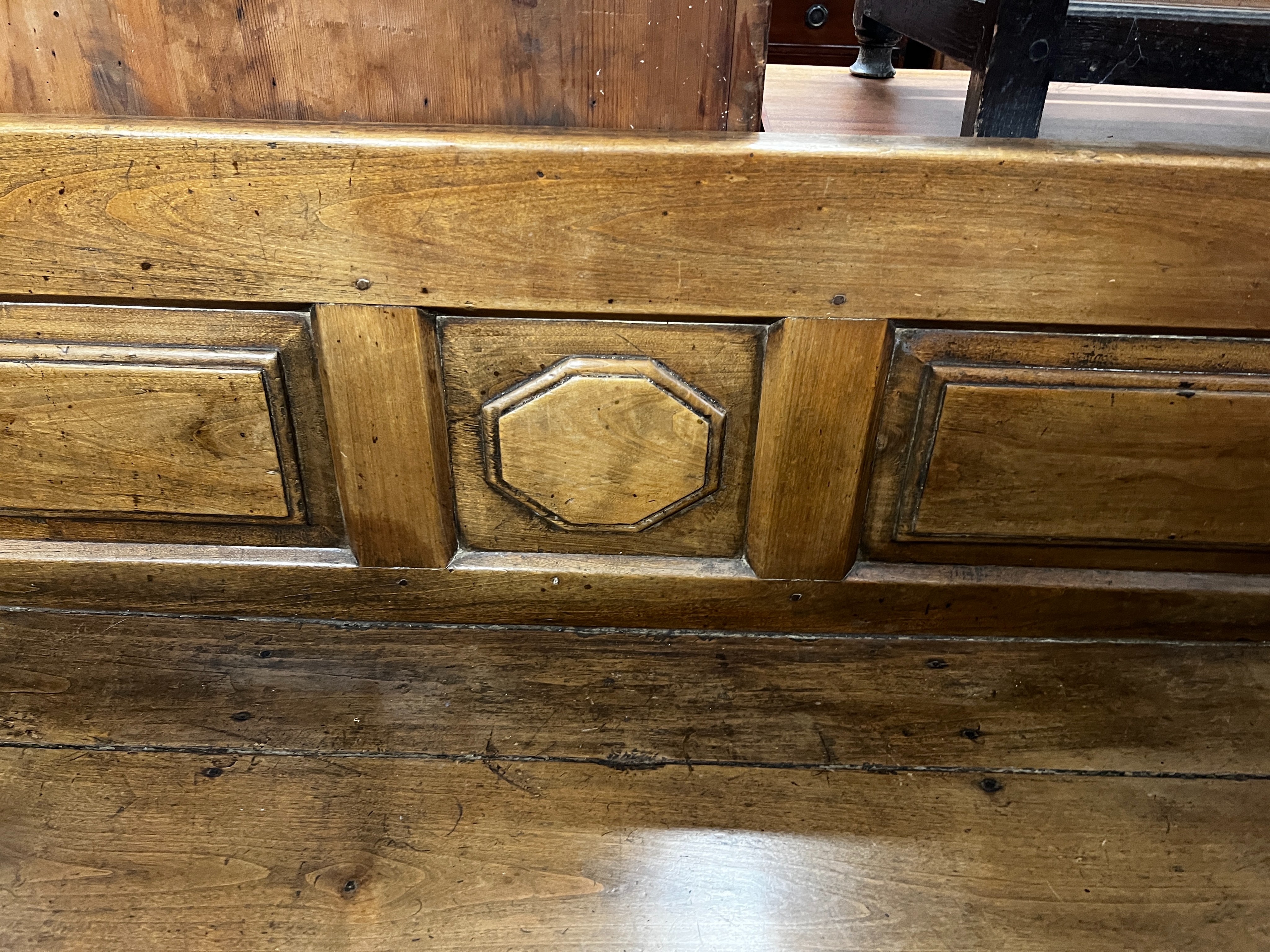 A 19th century Continental panelled settle, length 187cm, depth 70cm, height 92cm